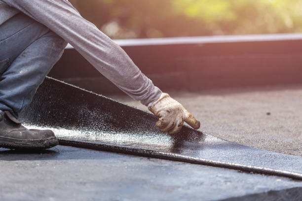 Professional Exterior Waterproofing technician working in Cambridge, MD